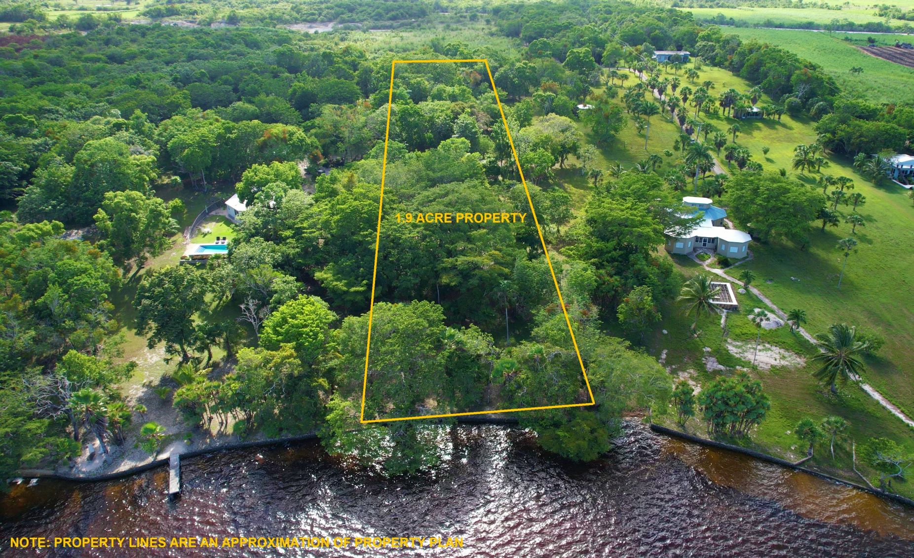 Two 1.9 acre Lagoon Front lots in Progresso Village, Corozal District